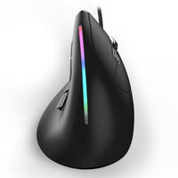 Vertical RGB mouse placed on office desk with laptop setup