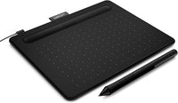 User drawing digitally on Wacom Intuos Small tablet connected to laptop