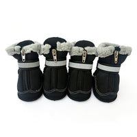 Winter dog paw boots with reflective details and adjustable fastening