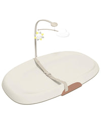 Overhead view of a grey contoured wipe-clean baby changing pad