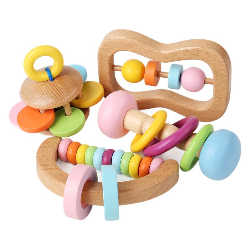 Front view of multicolor wooden baby rattles arranged together