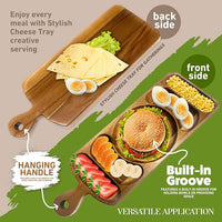 Wooden serving board arranged with cheese and crackers