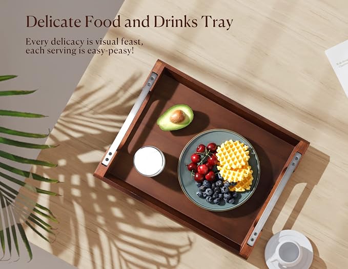 Round wooden serving board arranged with bread cheese and fruit